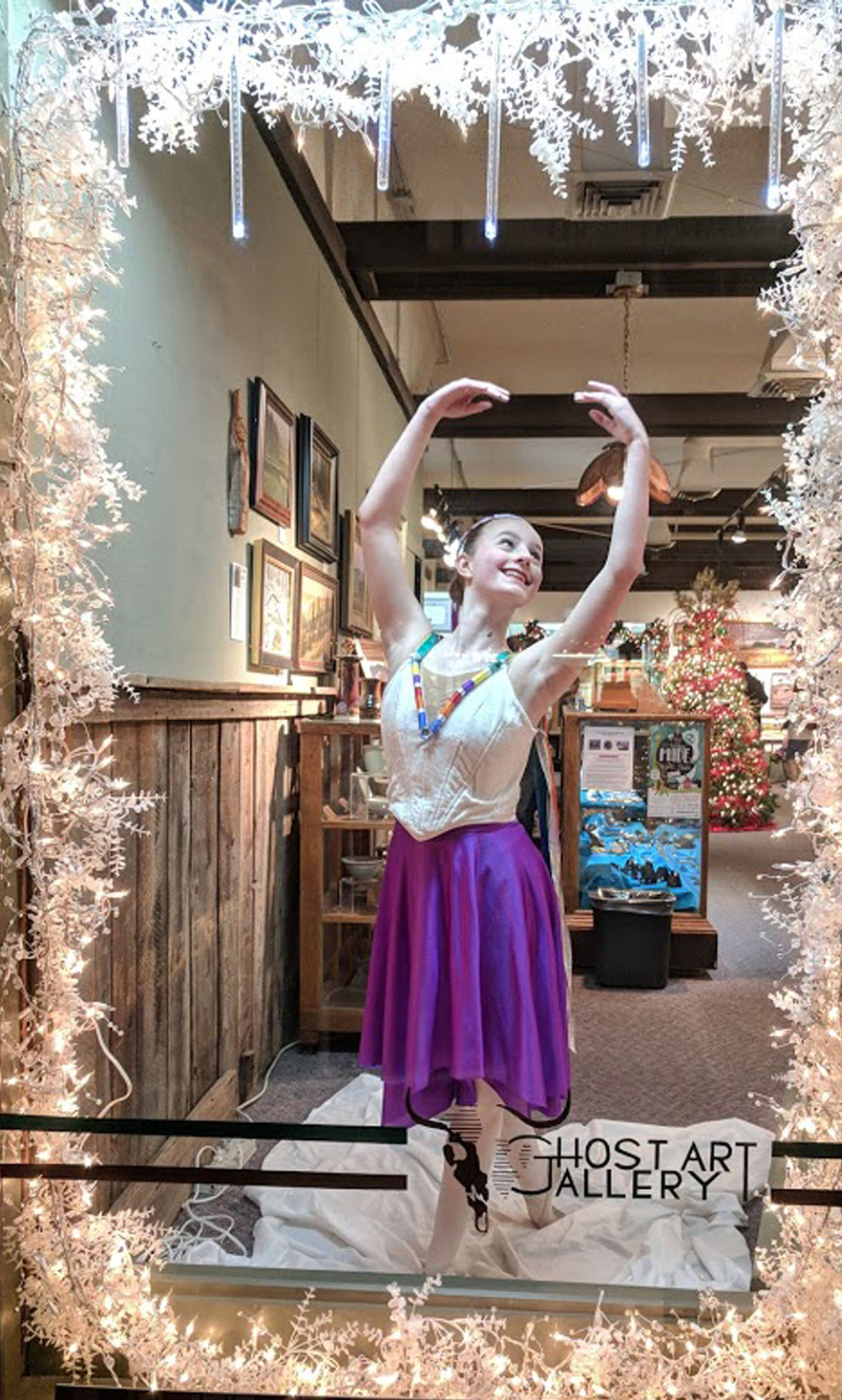 Ballerina poses in the Walking Mall